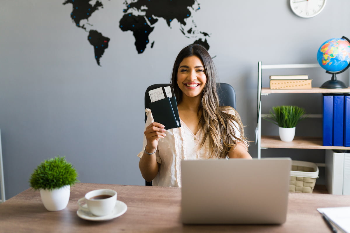 Portrait of a travel agent booking a flight